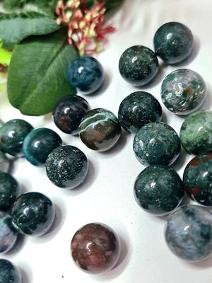 Moss Agate mini spheres.