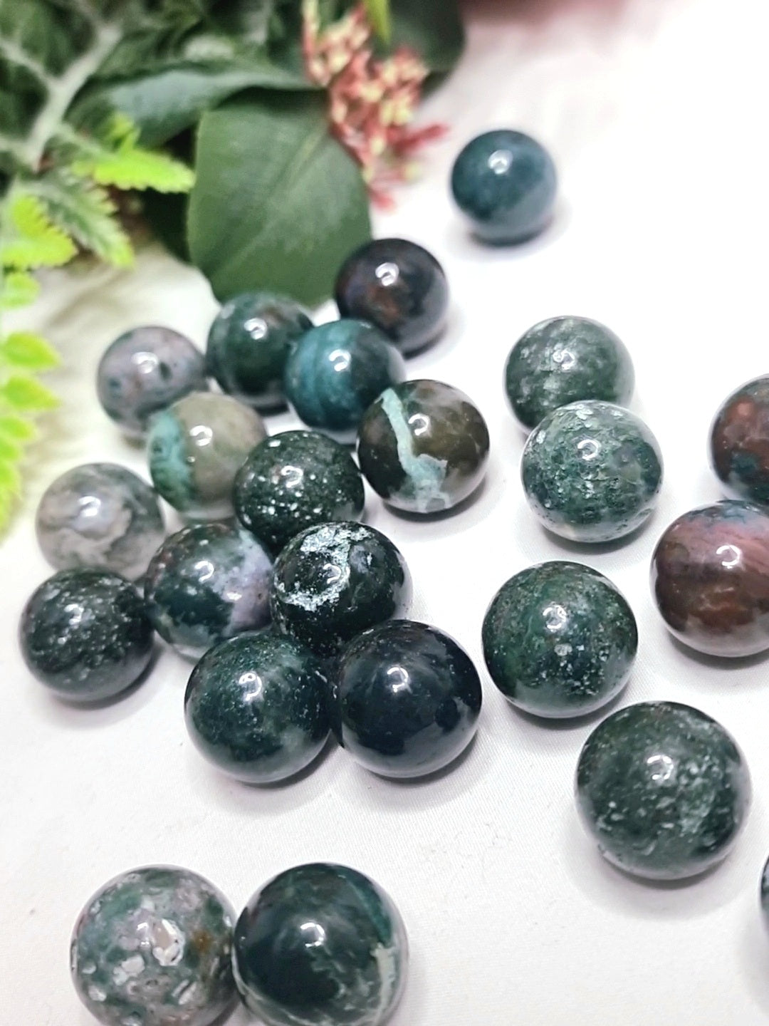 Moss Agate mini spheres.